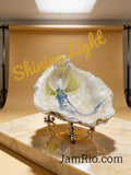Shining Light hand-painted oyster shell trinket dish with lighthouse design on a decorative metal stand