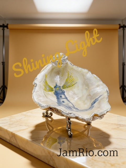 Shining Light hand-painted oyster shell trinket dish with lighthouse design on a decorative metal stand